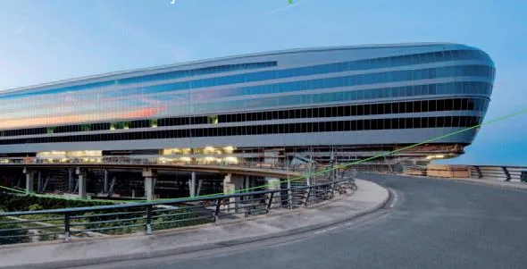 Modern building with a curved glass facade